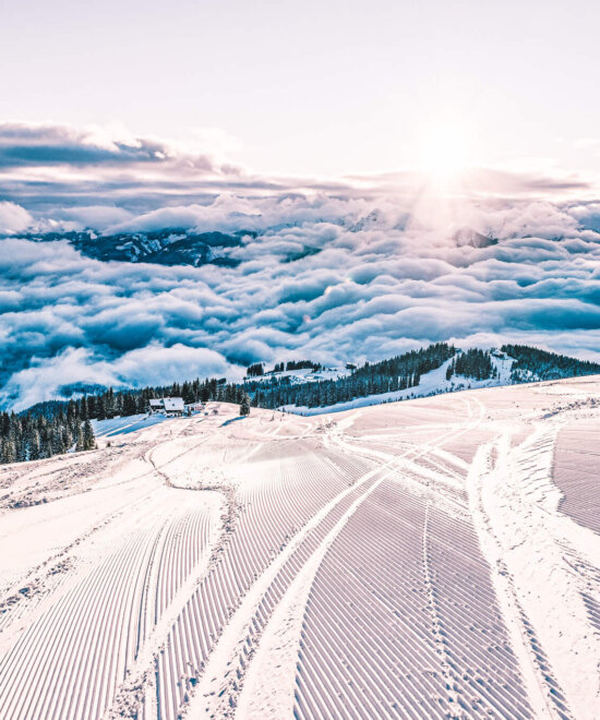 Skipiste über den Wolken